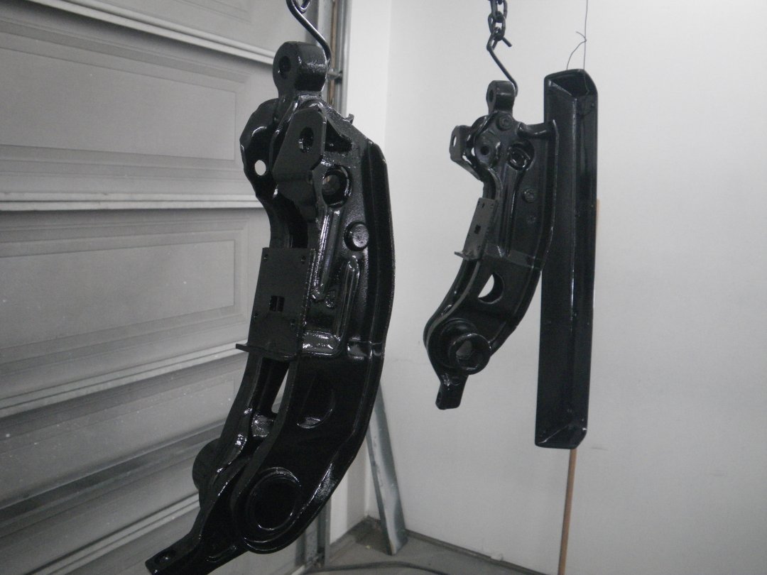 Lower Control Arms in Epoxy.JPG